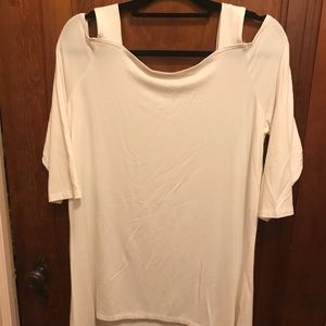 Kim Gravel large white top.